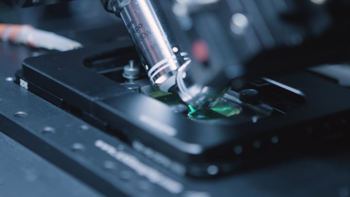 High-tech microscope used for scientific research and imaging in biological and medical fields.
