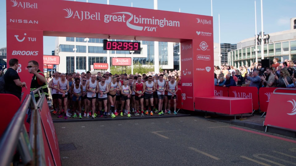 Elite marathon runners at the Birmingham Great Run starting line, captured by Film Division.