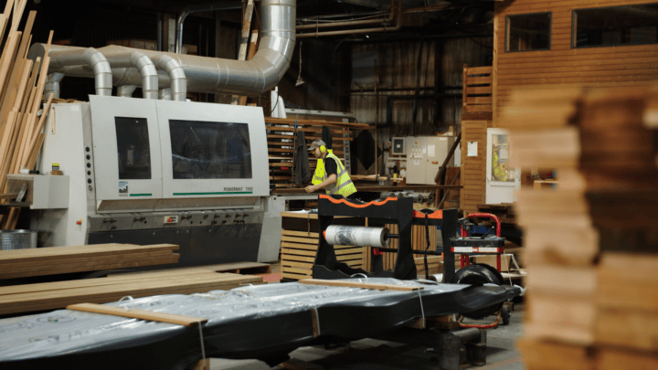 Eco-friendly wood processing in a sustainable factory setting.