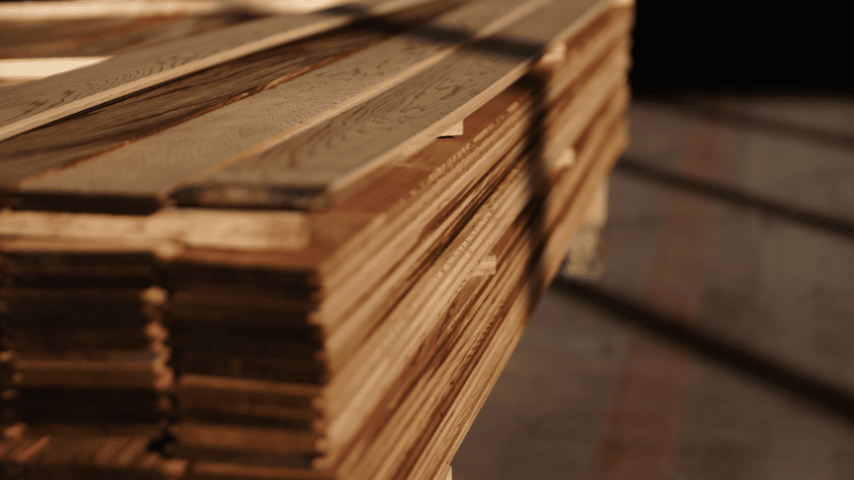 Stacked wooden pallets promoting sustainability and eco-friendly practices.